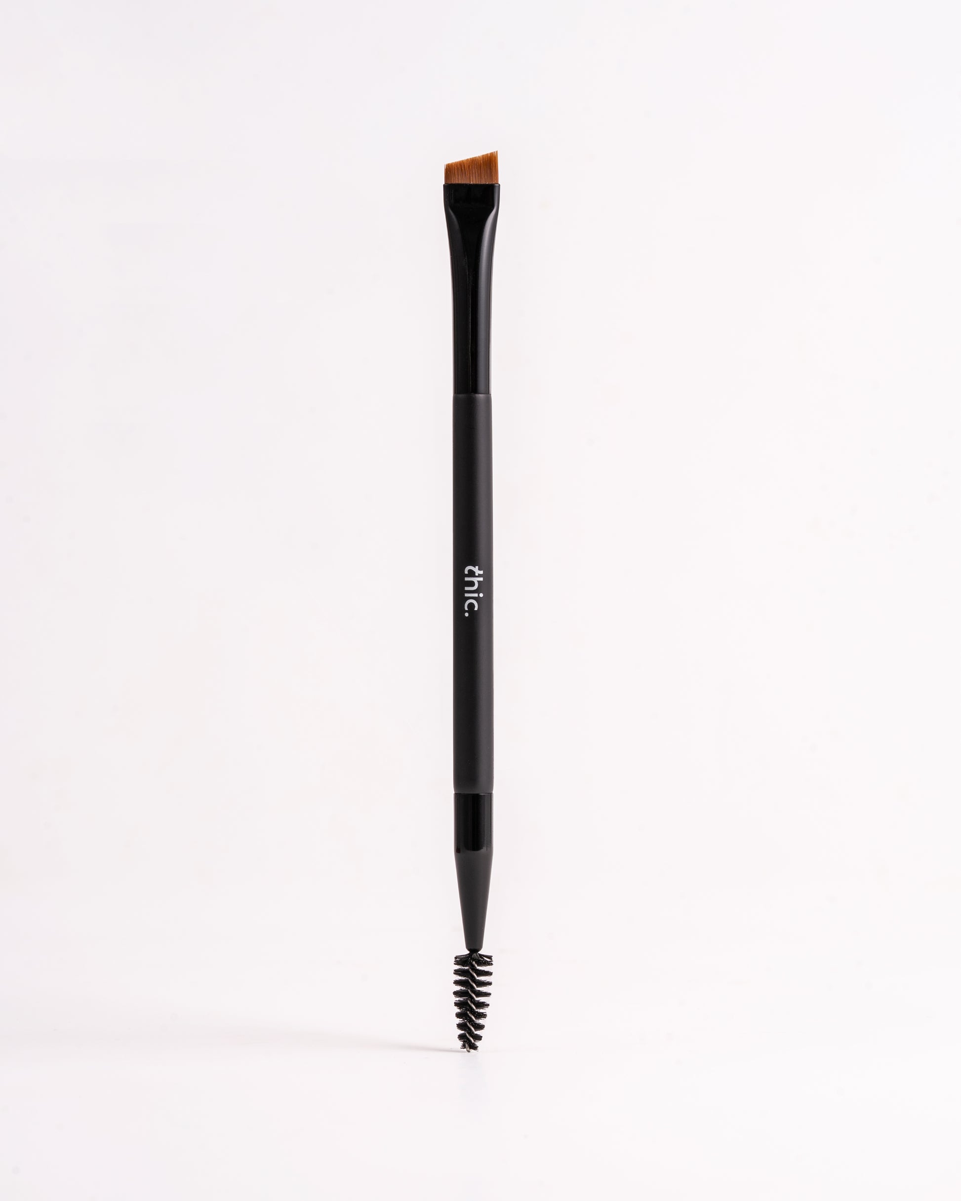 Thic Brow duo brush — dual-ended with angled brow brush and spoolie