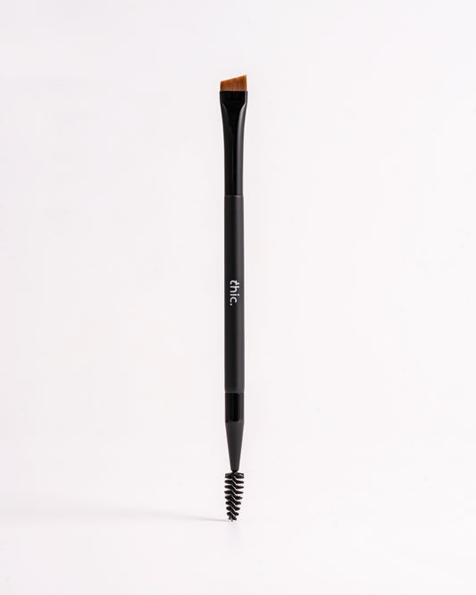 Black makeup brush with bristle head