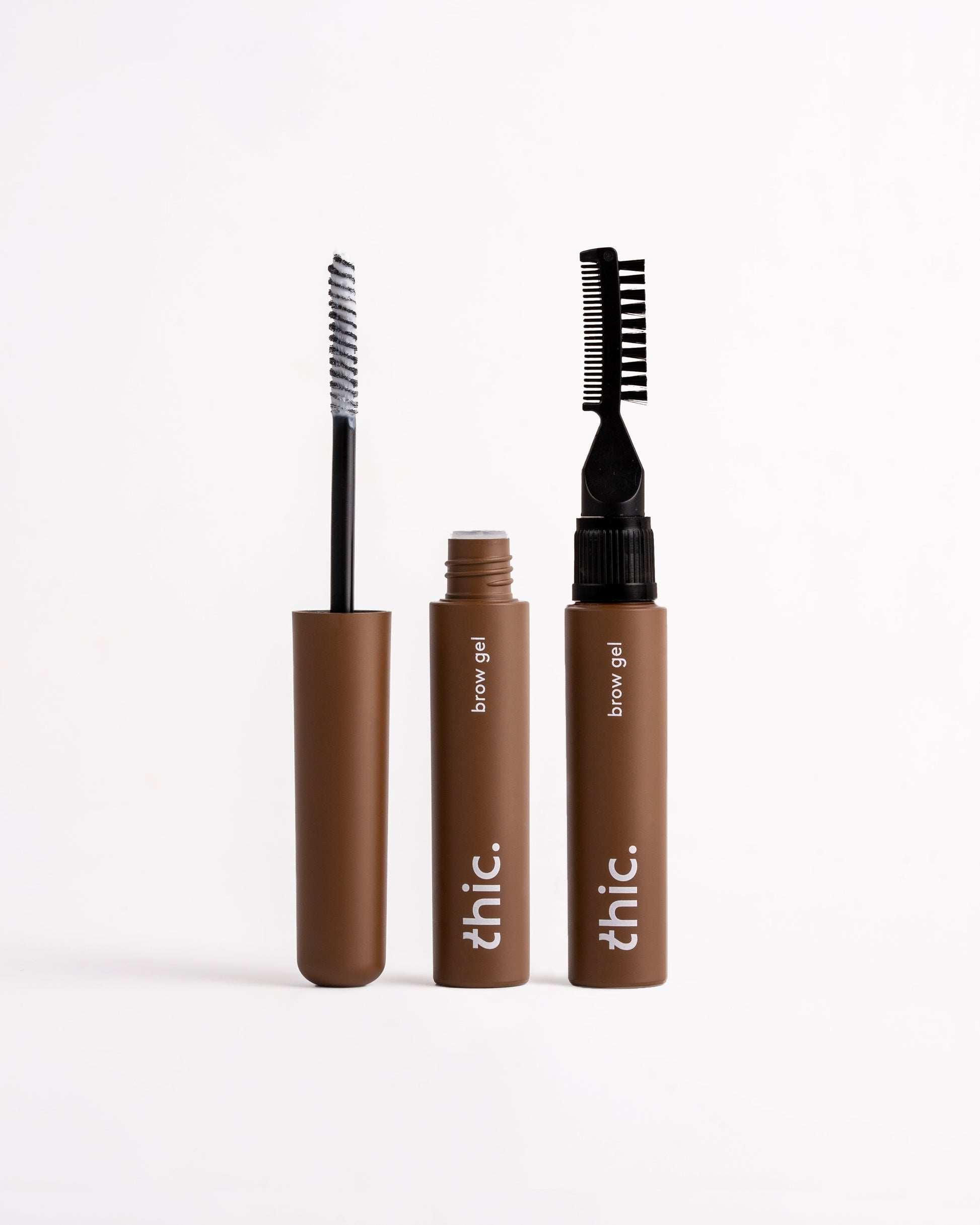 Thic Brow clear brow gel tube with brush and comb applicator. Strong all day hold
