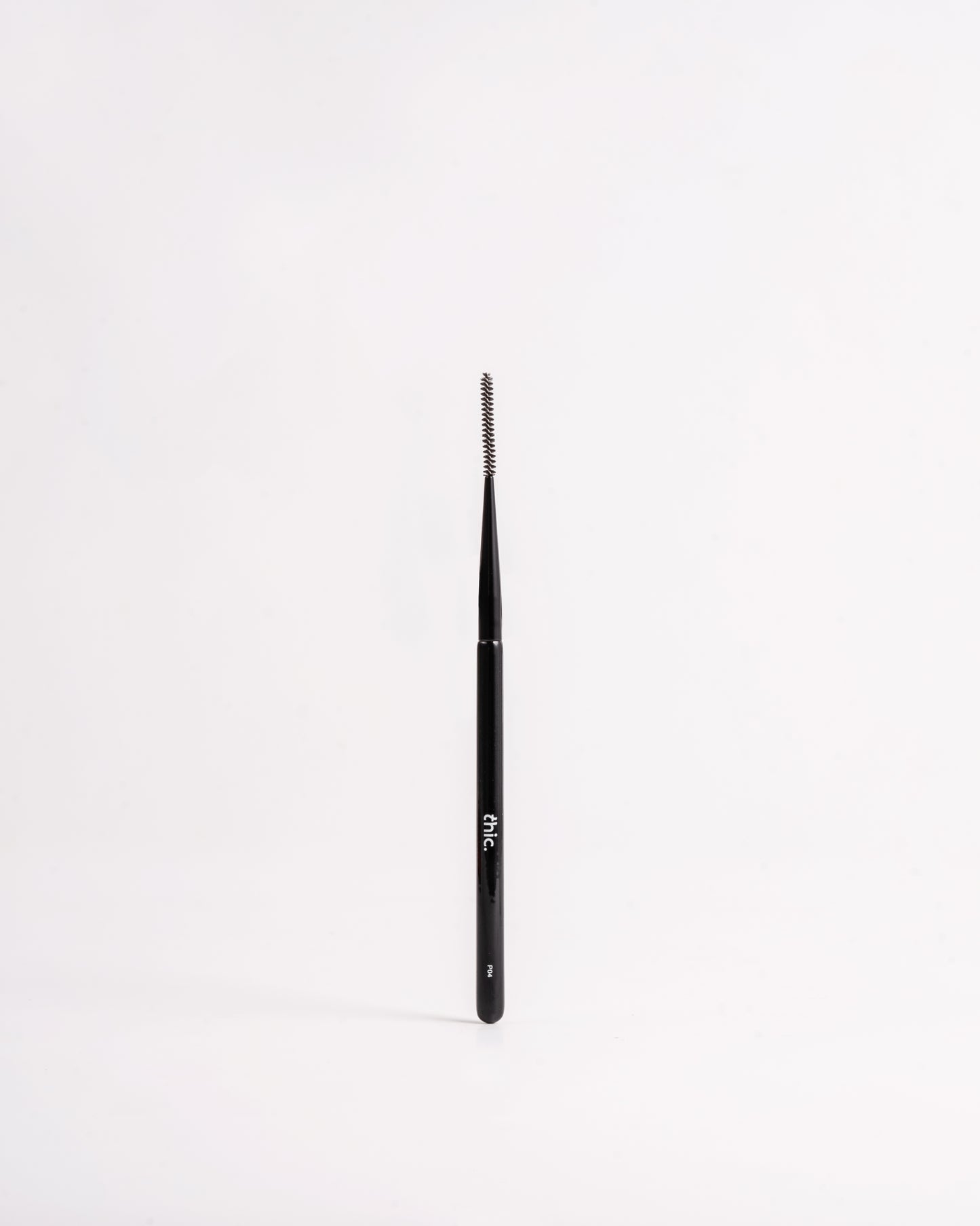 Black makeup brush on a white background