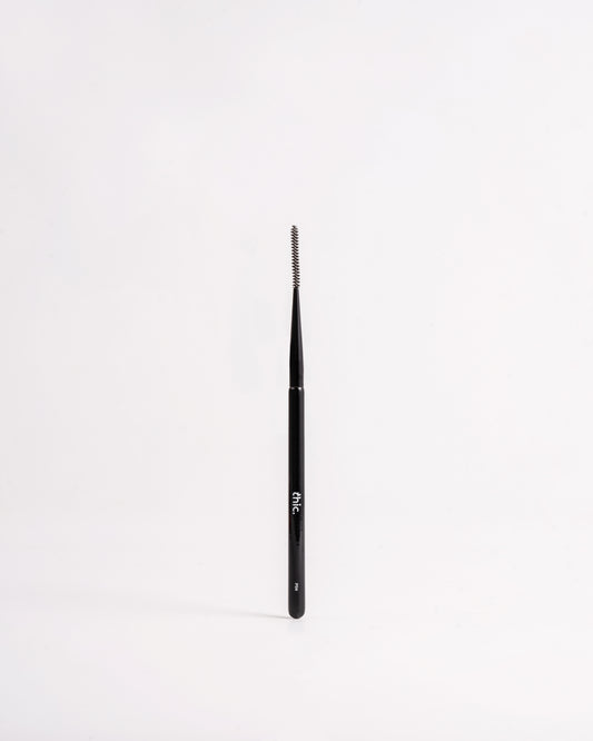 Black makeup brush on a white background